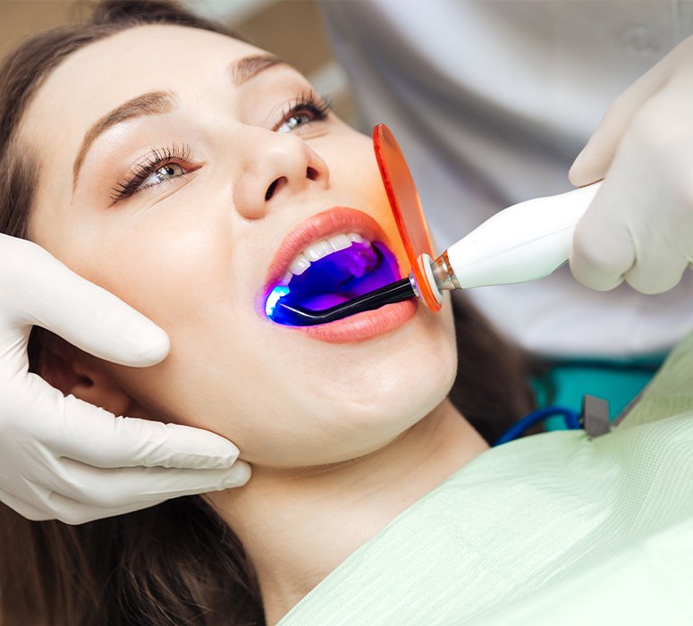 Patient receiving cosmetic dental bonding