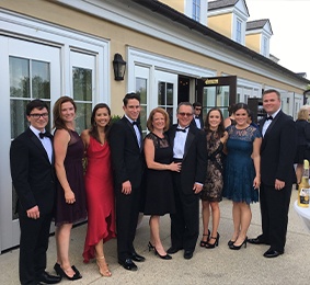 Doctor Faist and his family at formal event