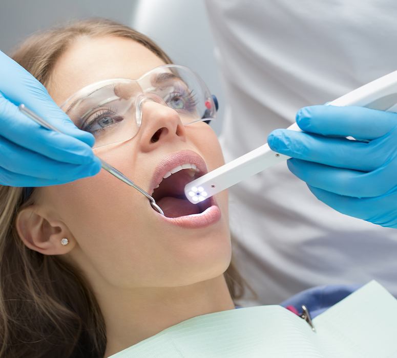 Dentist capturing intraoral images