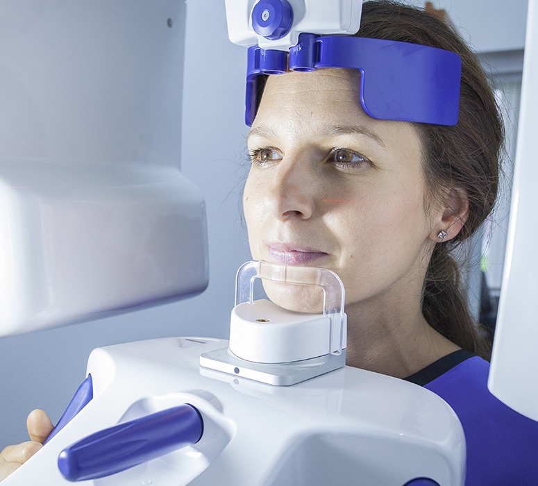 Woman receiving digital x-ray scan