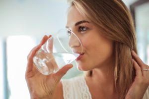 woman happy with her water quality