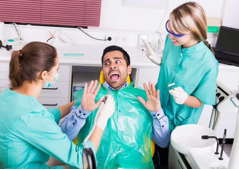 male patient scared at the dentist in Beachwood