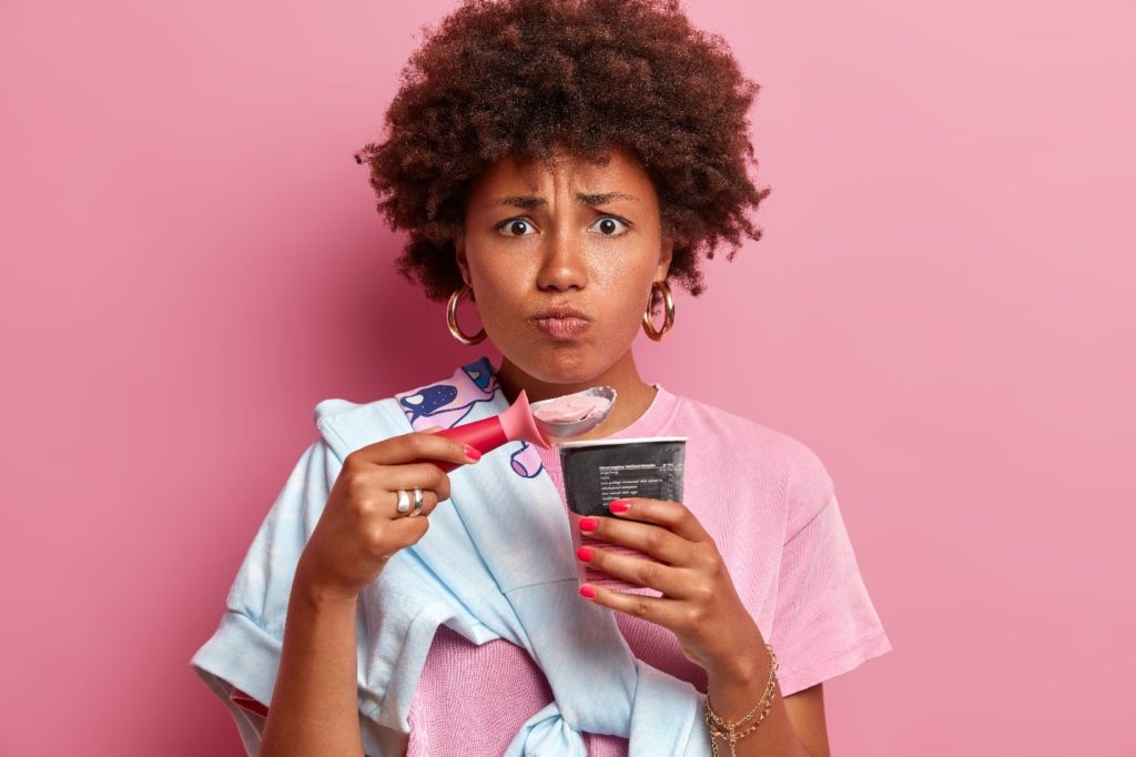 worried person eating ice cream