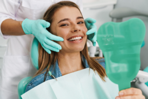 a patient with veneers showing off her smile